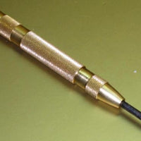 Automatic center punch spring loaded alloy steel point tool 5" .5" OD Brass body
